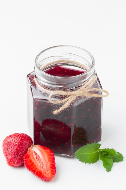 Arrangement with tasty jam in jar