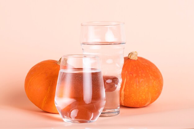 Arrangement with water and pumpkins