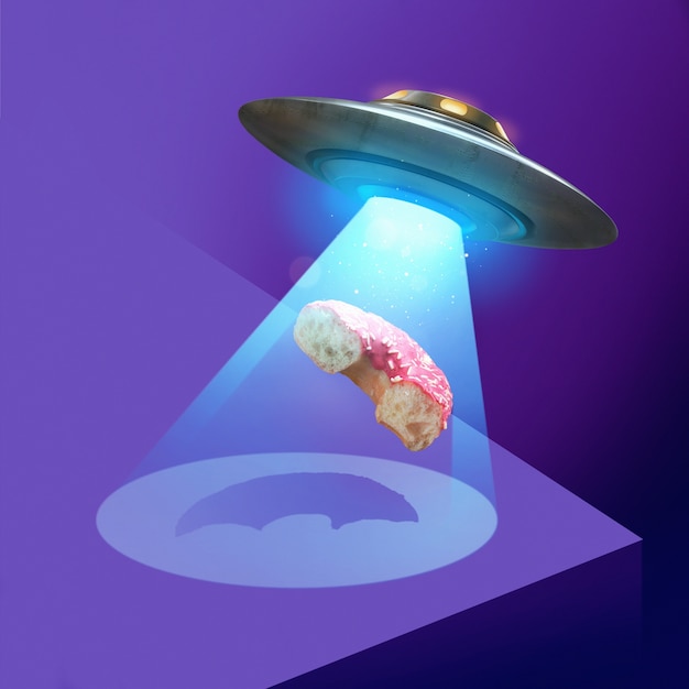 Arrival of aliens concept with doughnut