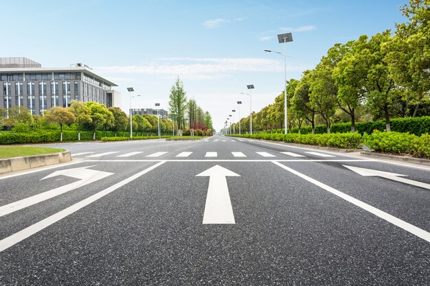 Arrows directions on asphalt