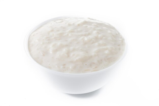 Arroz con leche Rice pudding with cinnamon isolated on white background