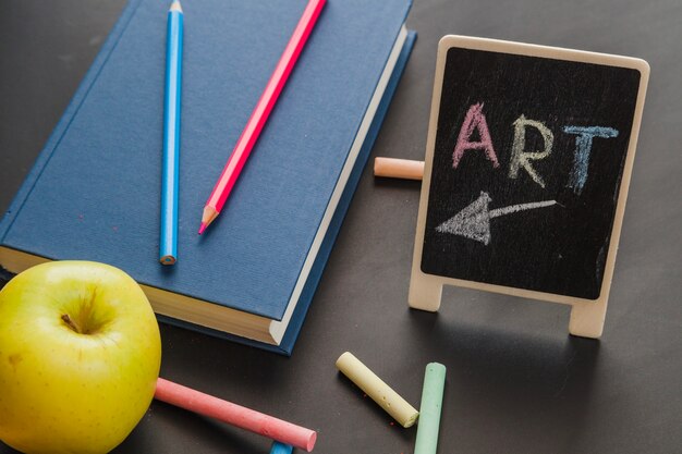 Art book on blackboard