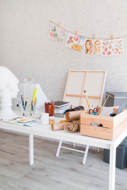 Art desk concept with painting supplies