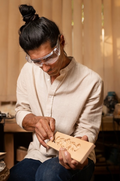 Artisan doing woodcutting