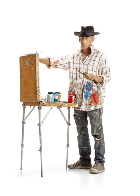 Artist painter at work isolated