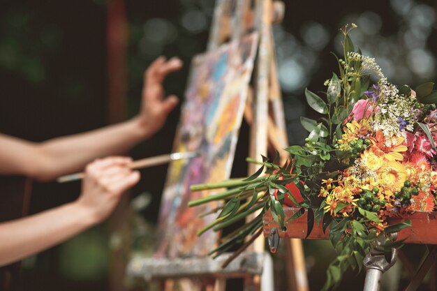 Artist's hand close-up on the background of picture