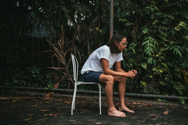 Artsy man relaxing outdoors