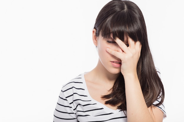 Free photo ashamed woman covering face