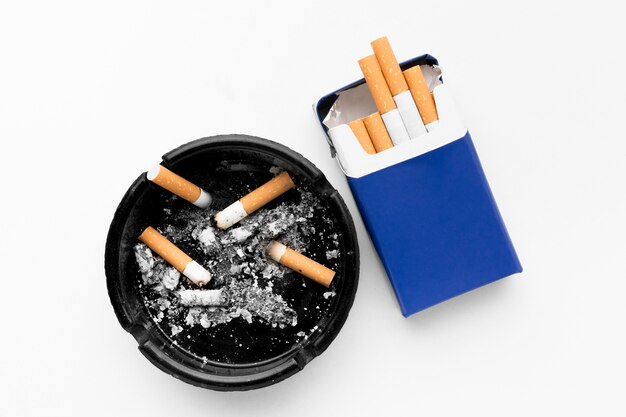 Ashtray and pack of cigarettes