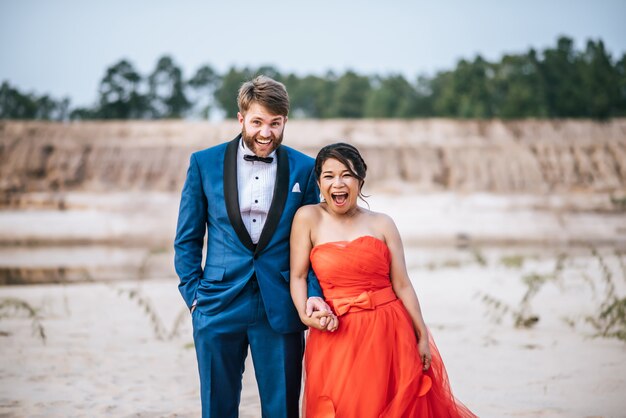 Asian bride and Caucasian groom have romance time and happy together 