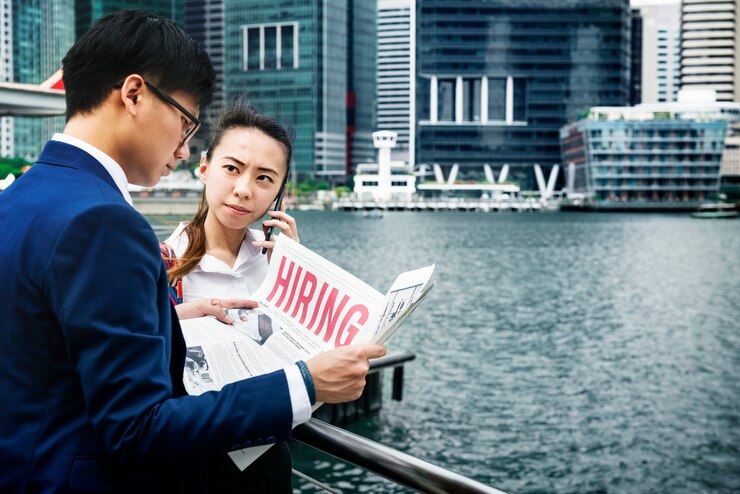 ฟรี Photo asian business people in a city working together