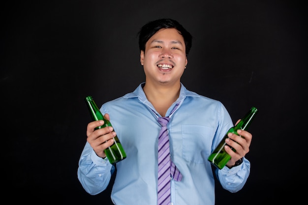 asian businessman with beer bottles