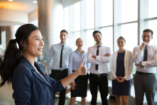 Asian Businesswoman with Thumb up Gesture