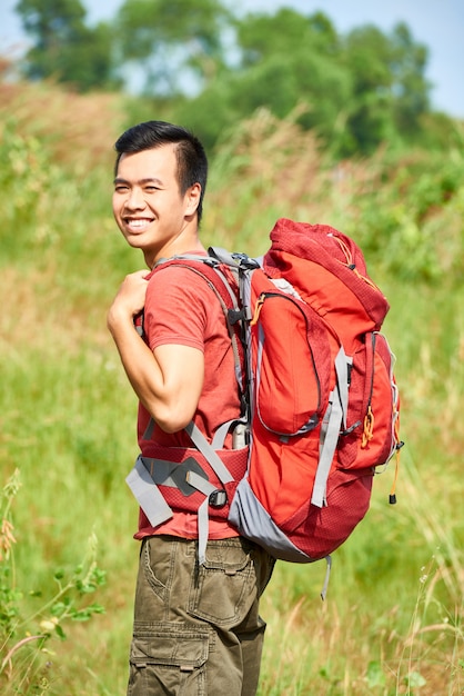 Free photo asian cheerful hiker