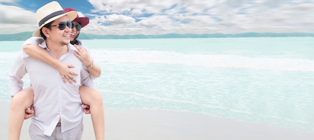 Asian couple on beach