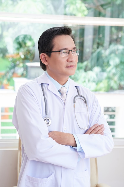 Asian doctor at office
