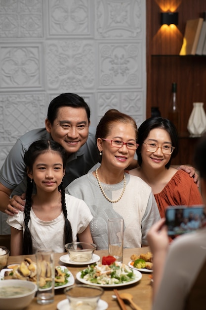 Asian family eating together