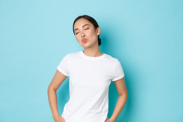 Free photo asian female in casual t-shirt posing