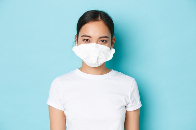 Asian female in casual T-shirt posing