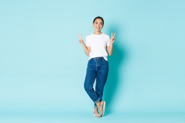 Asian female in casual T-shirt posing