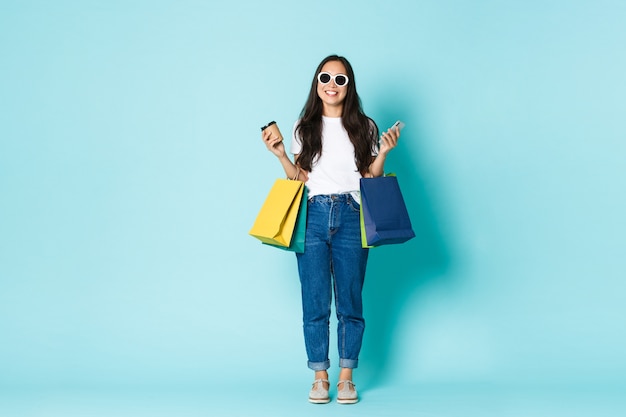 Asian female in casual T-shirt posing