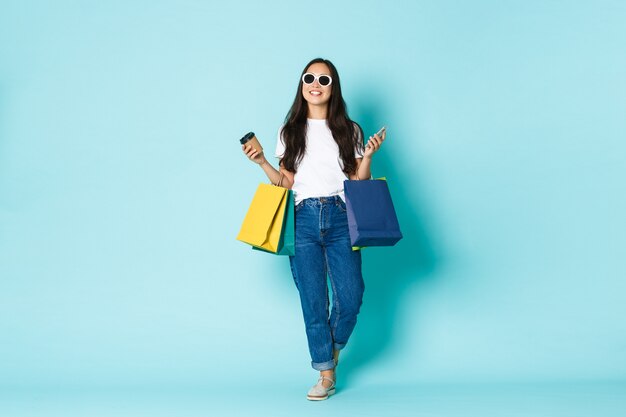 Asian female in casual T-shirt posing