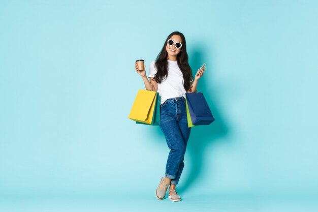 Asian female in casual T-shirt posing