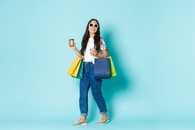 Asian female in casual T-shirt posing