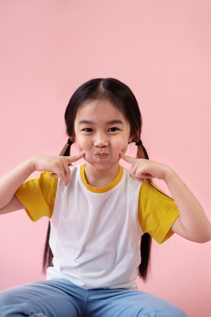 Asian girl making gesture