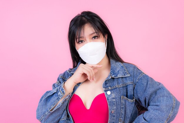 Asian girl wearing protective face mask for protection during the quarantine