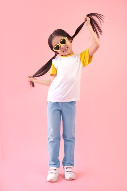 Asian girl with heart-shaped sunglasses