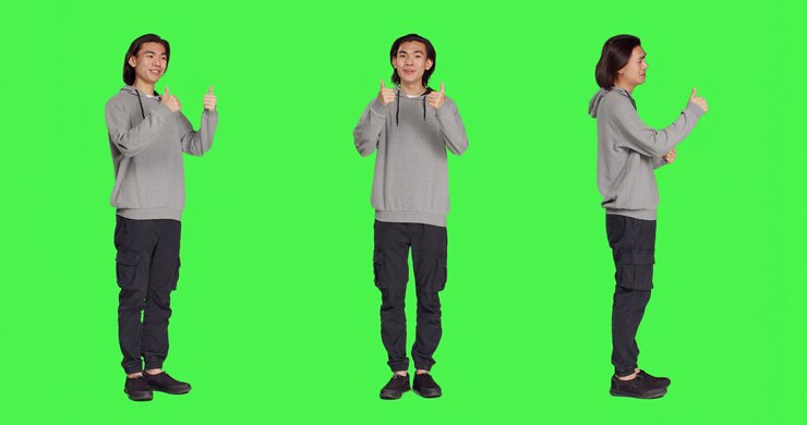 無料Photo アジア人男性が親指を立てるジェスチャーをする