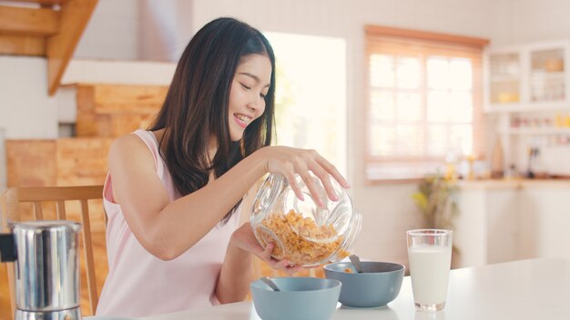 Asian Japanese woman has breakfast at home. 