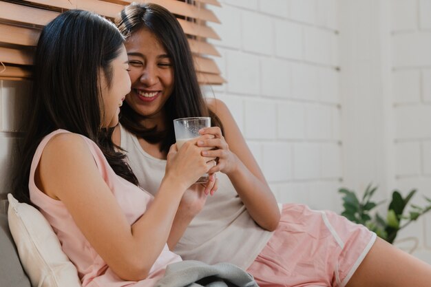 Asian Lesbian lgbtq women couple have breakfast at home. 