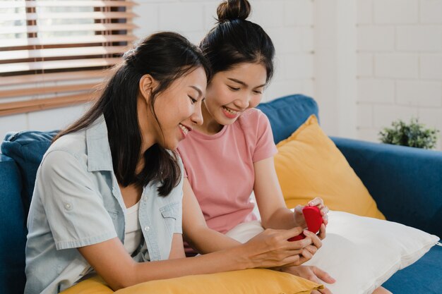 Asian Lesbian lgbtq women couple propose at home