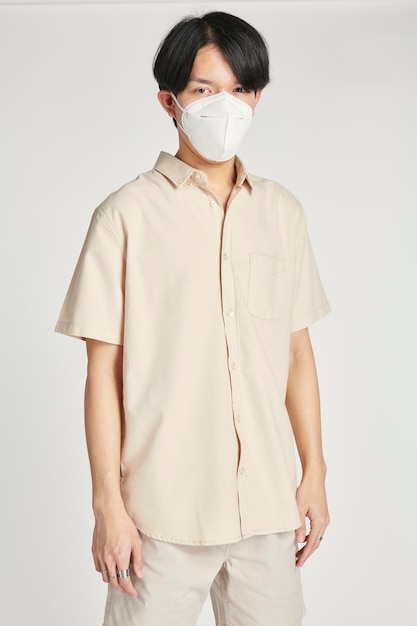 Free photo asian man in a face mask mockup