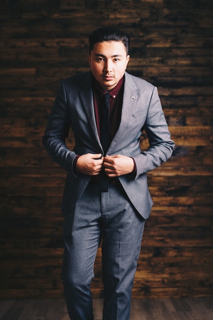 Asian man wearing suit