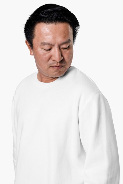 Asian man wearing white sweater close-up