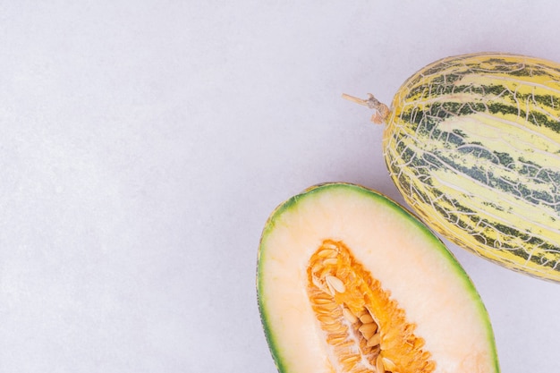 Asian melons isolated on grey surface