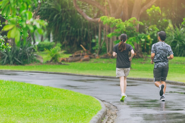 Premium Photo | Asian people running in the park jogging everyday for  healthy concept.