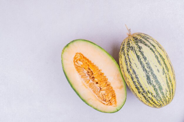 Asian sort of melon isolated on white.