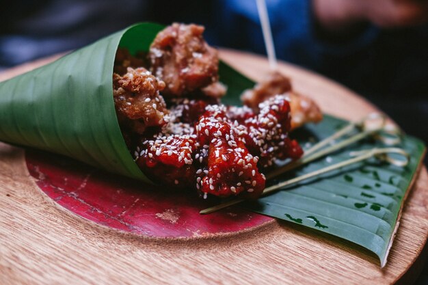 Asian street food on green leaves