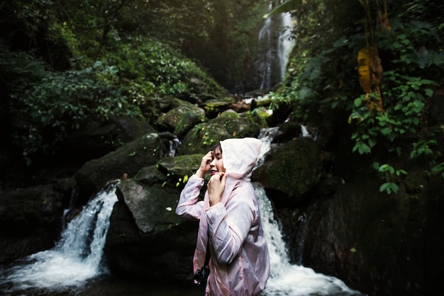 Asian woman enjoying an outdoor trip