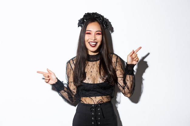 Asian woman in Halloween costume posing