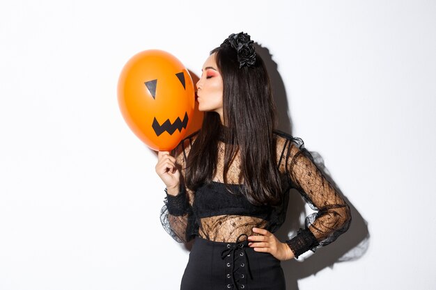 Free photo asian woman in halloween costume posing