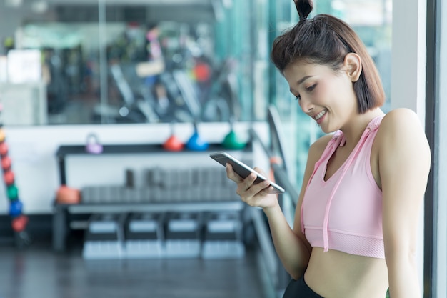 asian woman play fitness in the gym