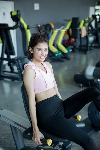 asian woman play fitness in the gym
