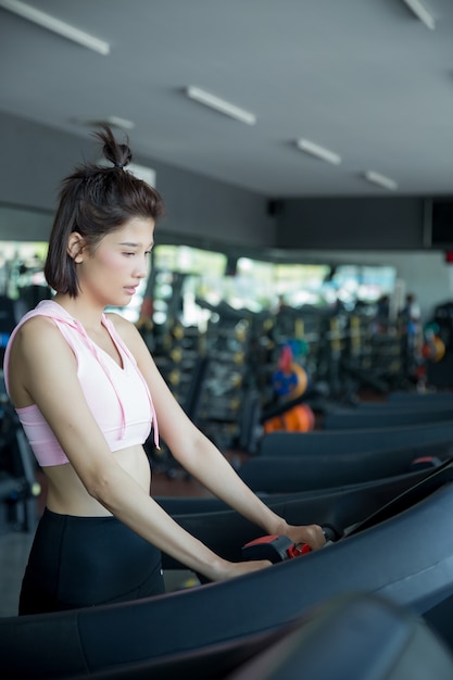 asian woman play fitness in the gym