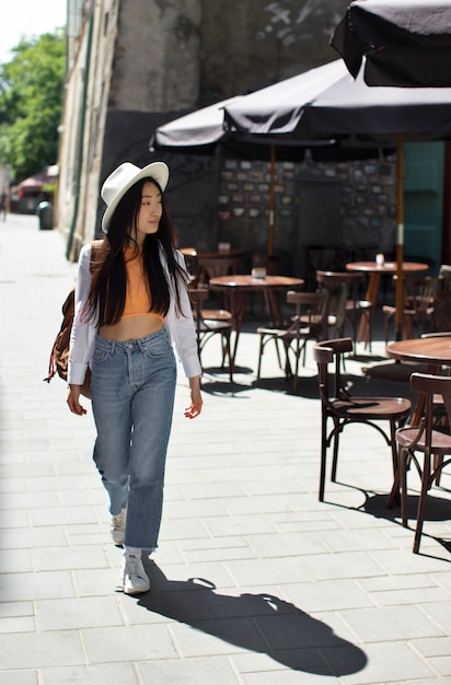 Free photo asian woman travelling in a local place