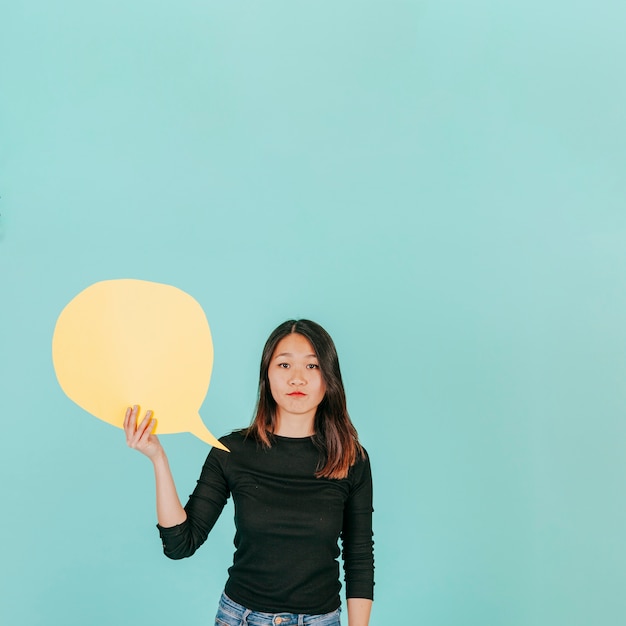 Asian woman with speech bubble